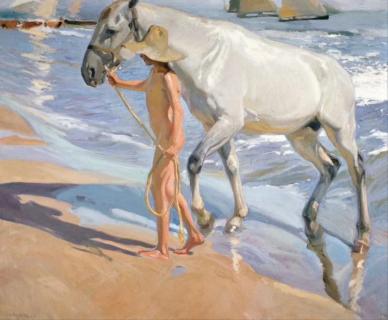 We see a sunny bright day, a young man leads a horse to the shore, everything is shrouded in warm summer light. In the shadows we see more cold shades (violet, greenish and blue) than on the illuminated elements. «Horse Bathing», author: Joaquin Sorolla.