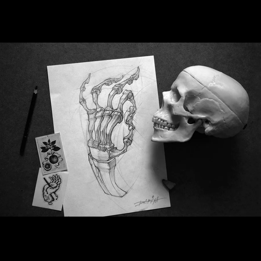 the process of drawing a bony hand of a person